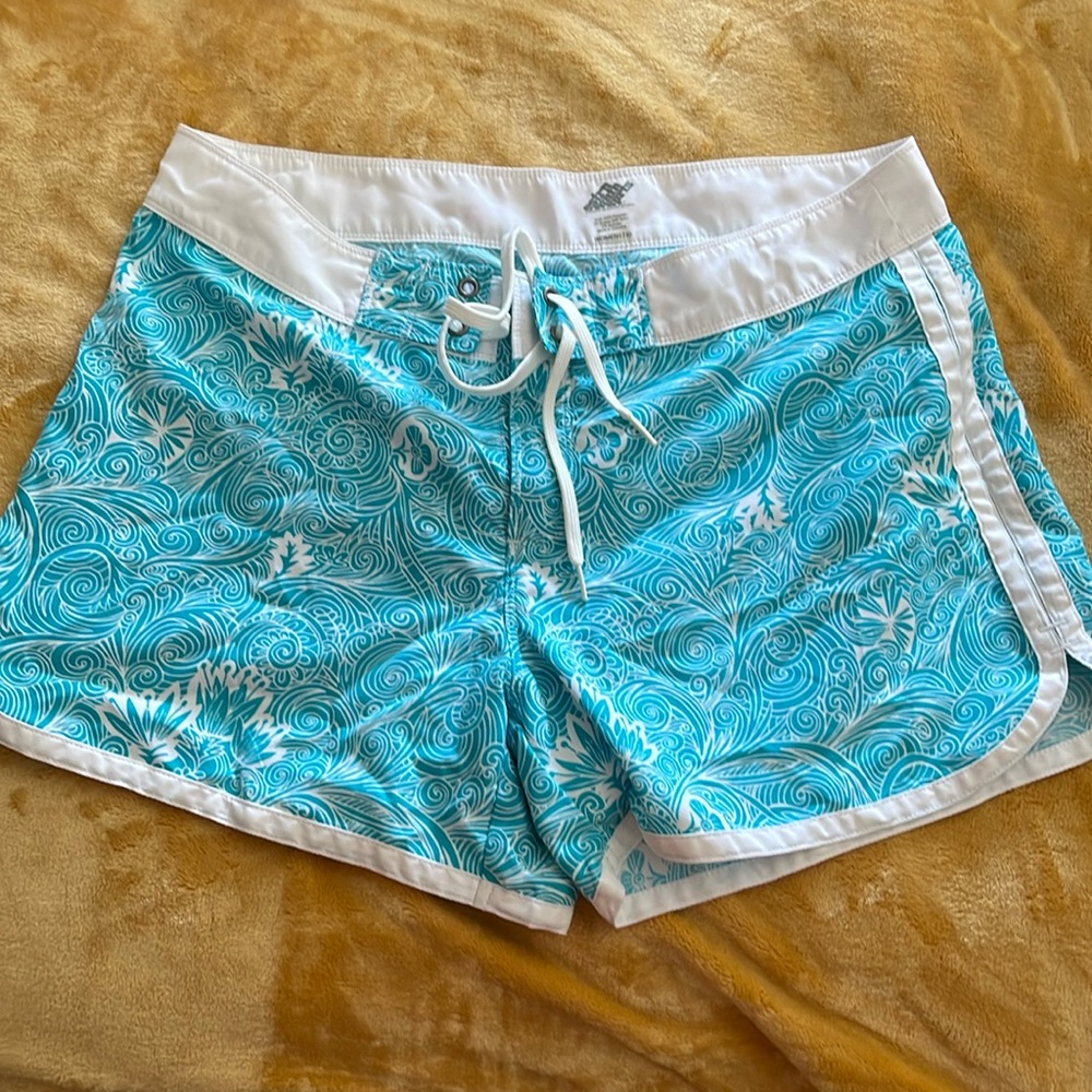 Woman’s swim shorts size 10. Teal and white design